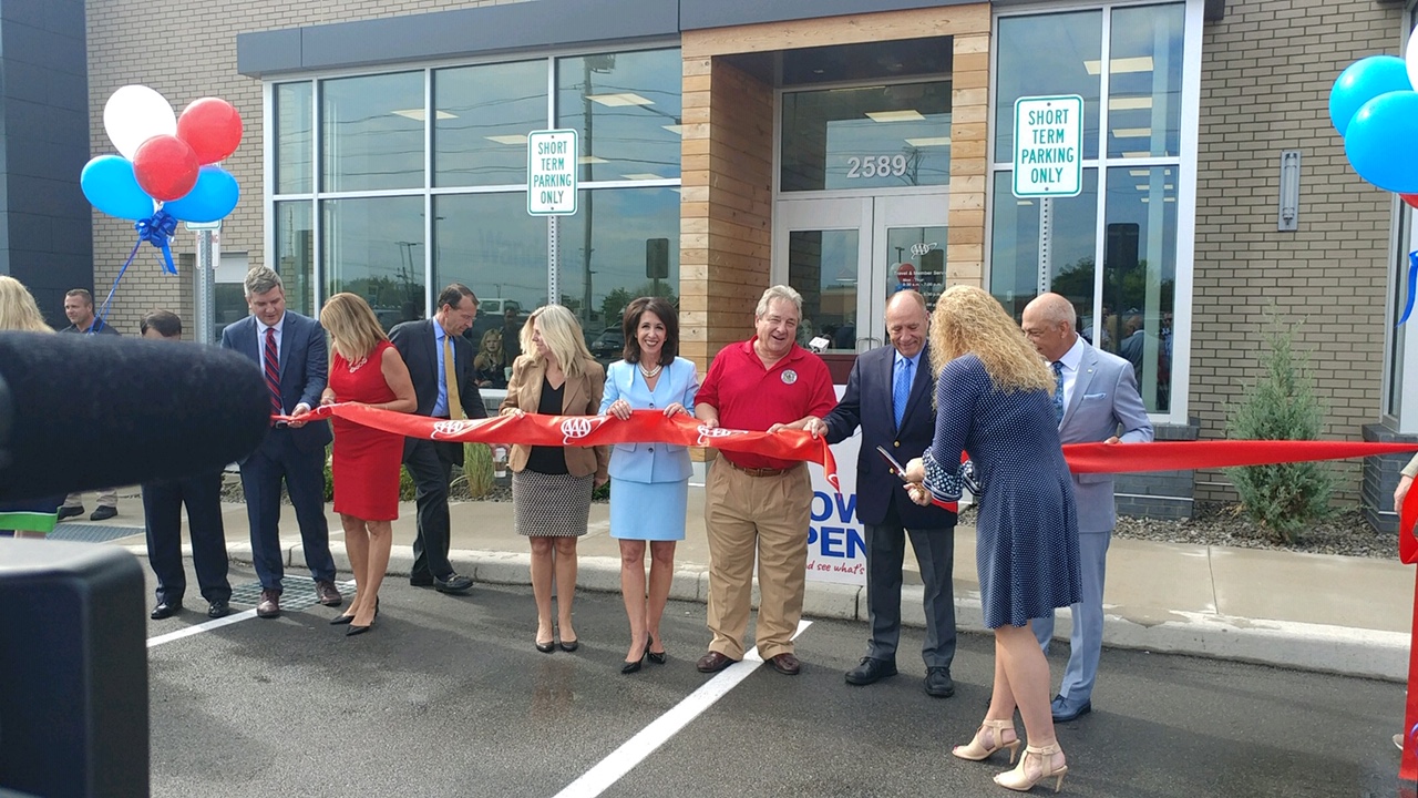 Ribbon cutting at AAA new Greece location 