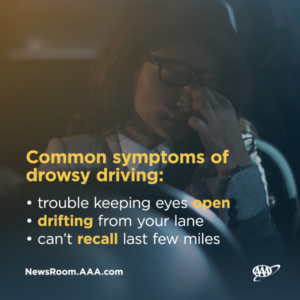 drowsy driving symptoms woman behind wheel looking tired
