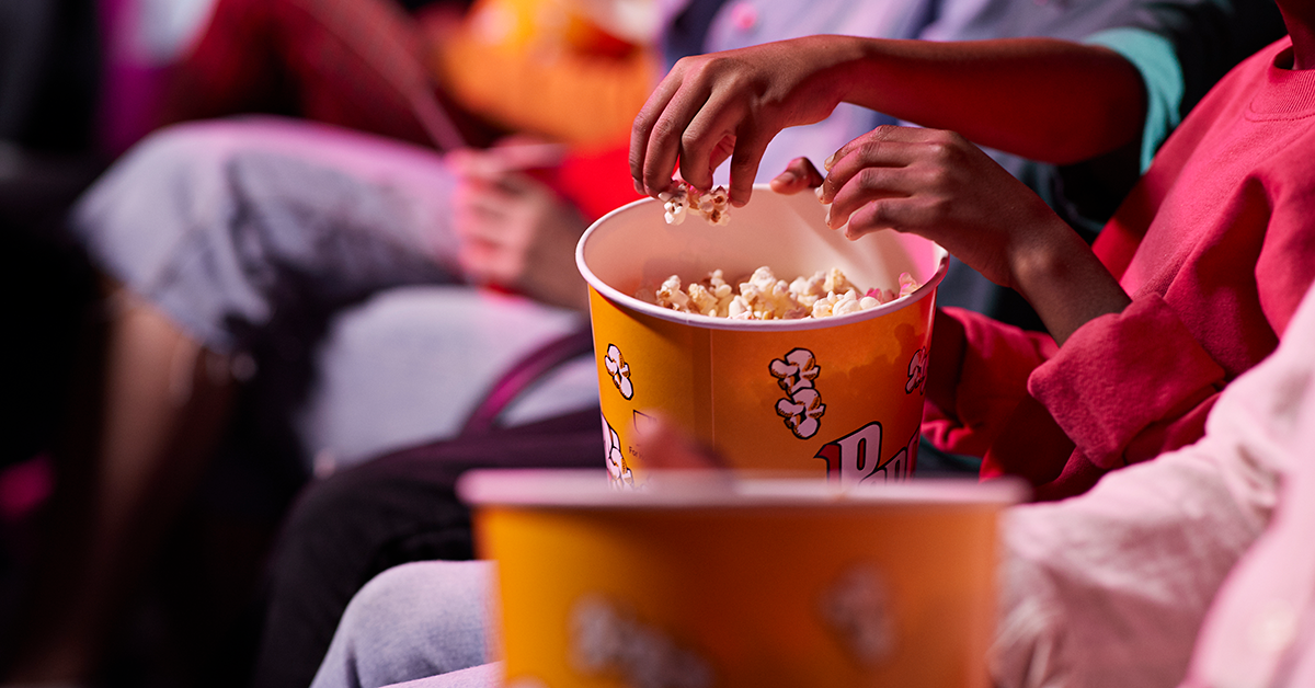 Eating popcorn at the movies