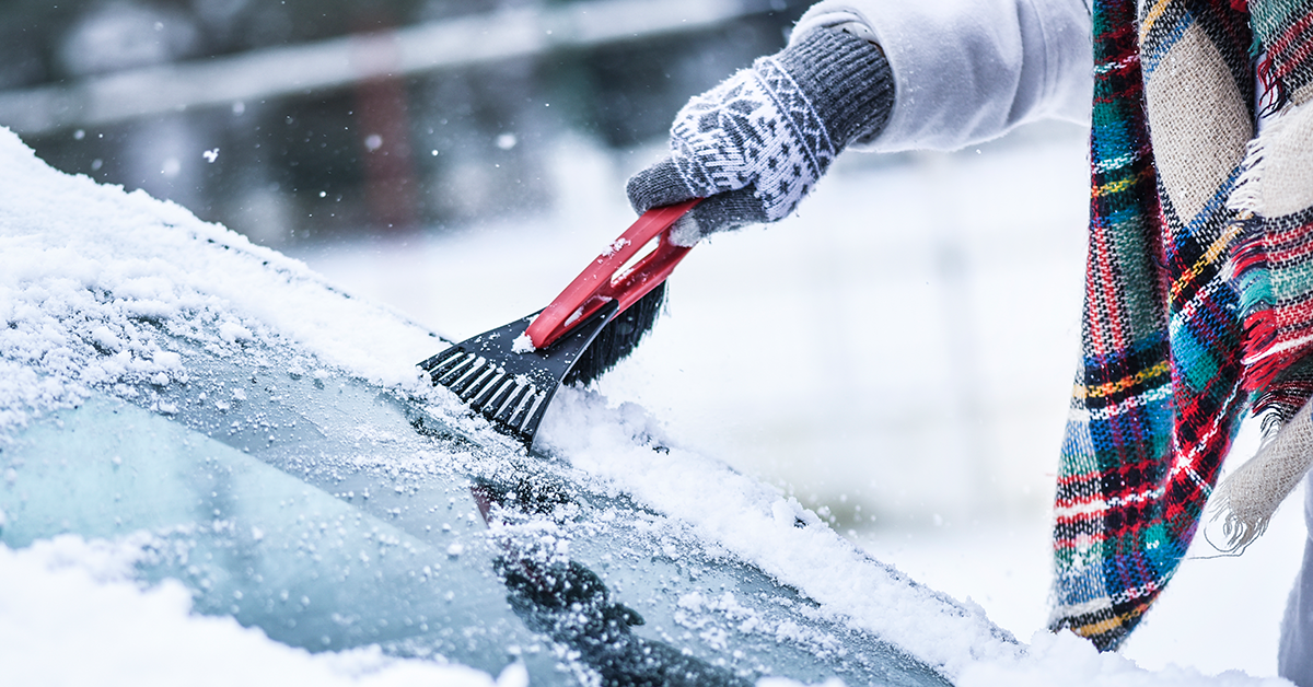 Scraping an icy windshield
