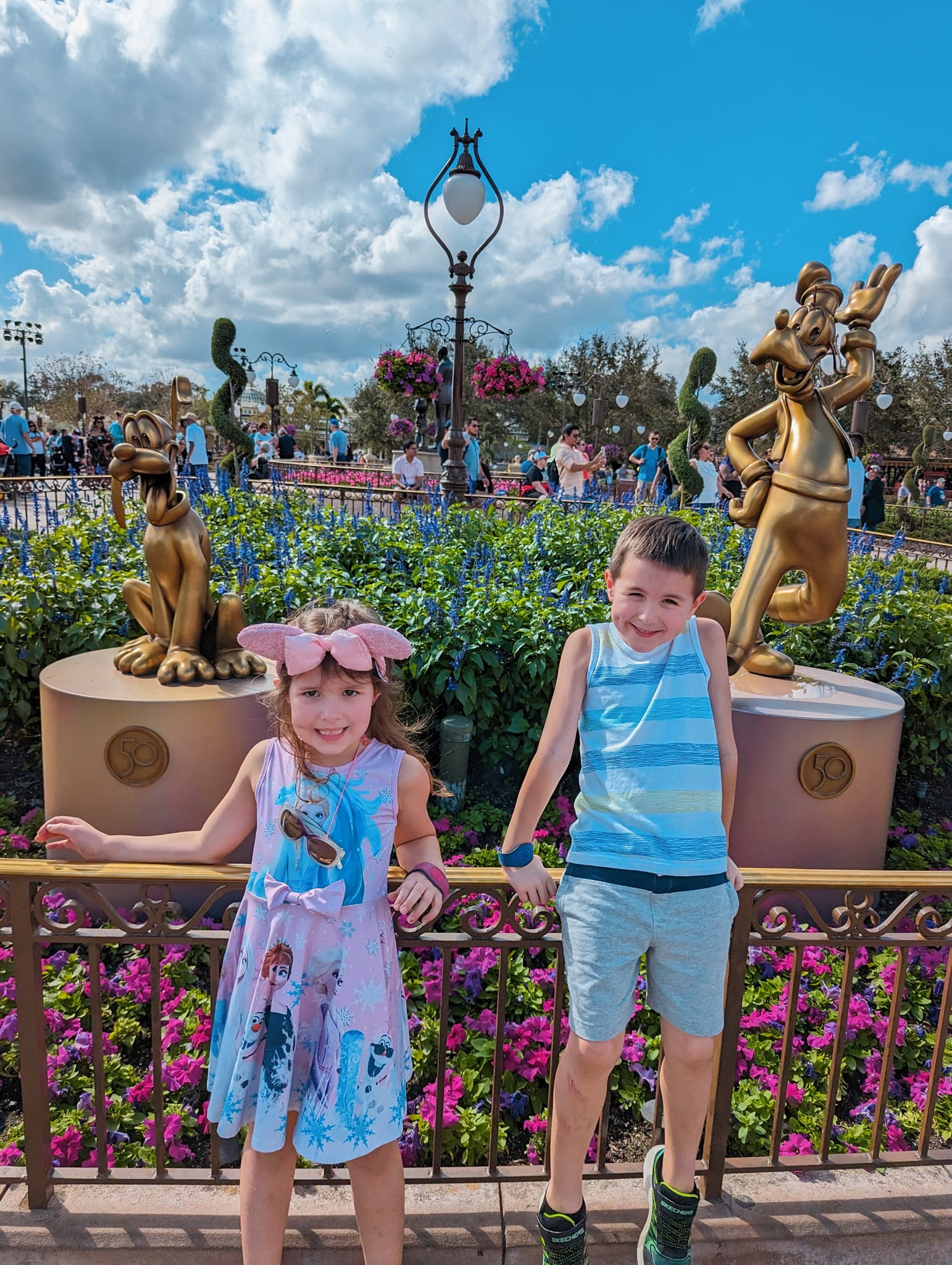 Glaser's twins pose at Disney World