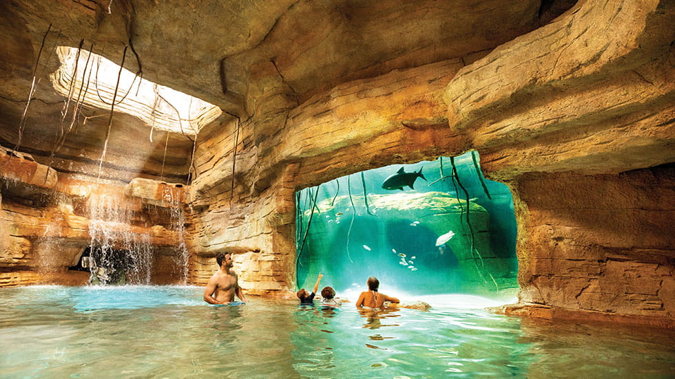 A cave and a fish-filled cenote