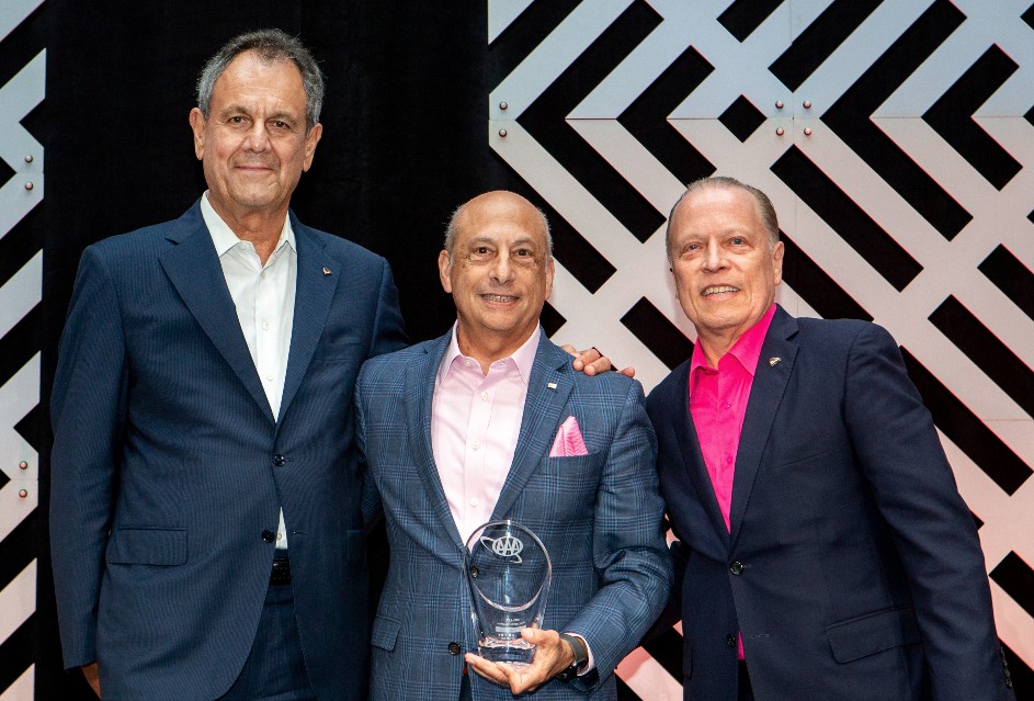 Past-Chair AAA Board of Directors Tony Buzzelli, Tony Spada, and AAA President and CEO Marshall Doney pose with the Association Champion Award