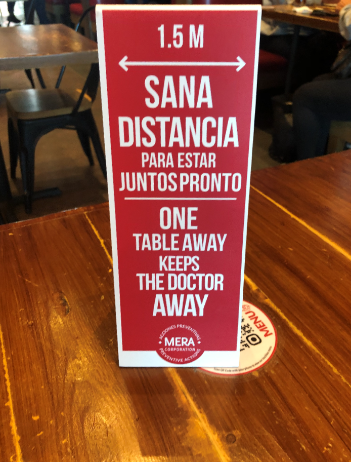 mexico airport safe social distance sign