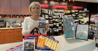 travel agent holds aaa supplies